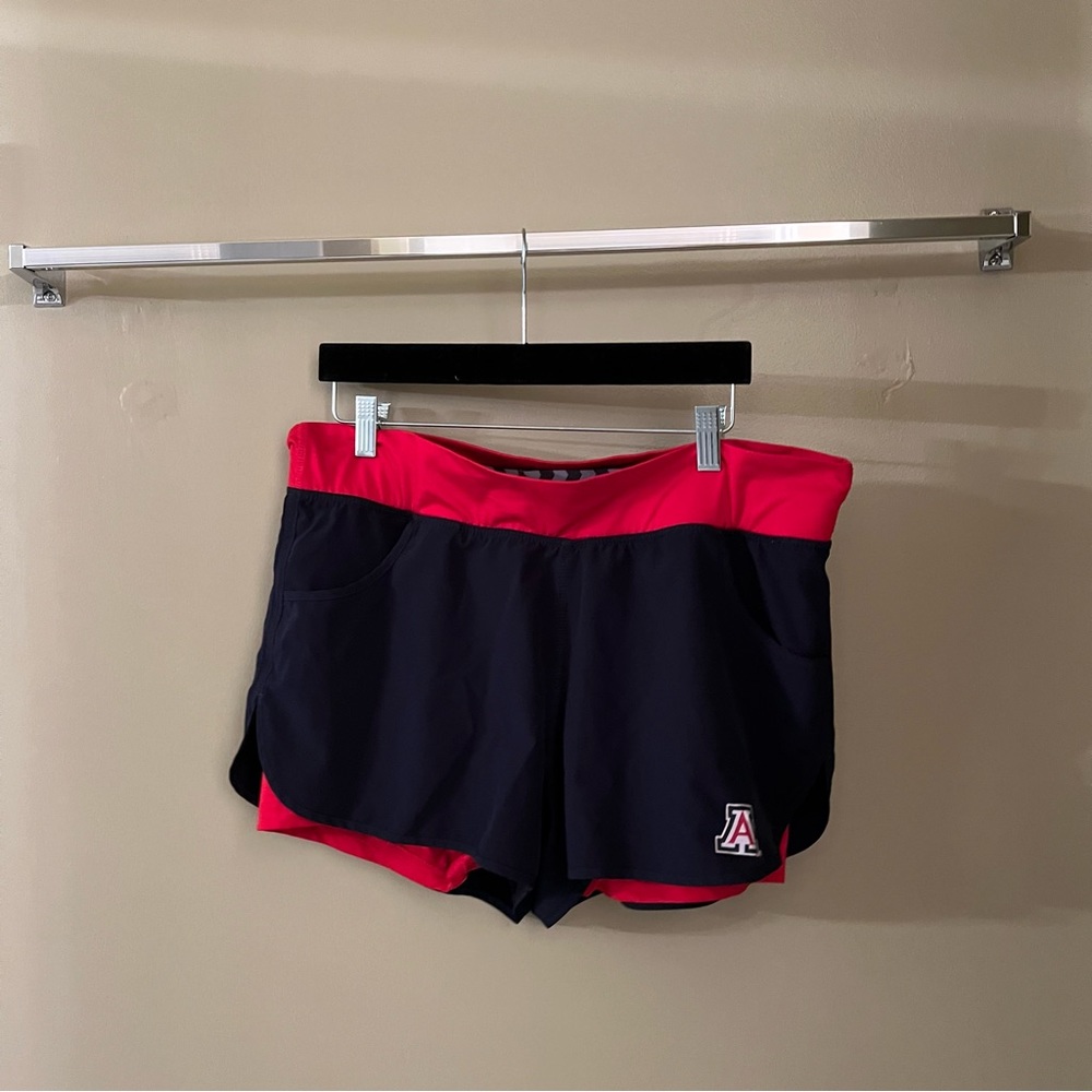 University of Arizona sport shorts with red spandex under